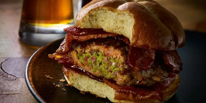 Bacon Guacamole Stuffed Sausage Burgers